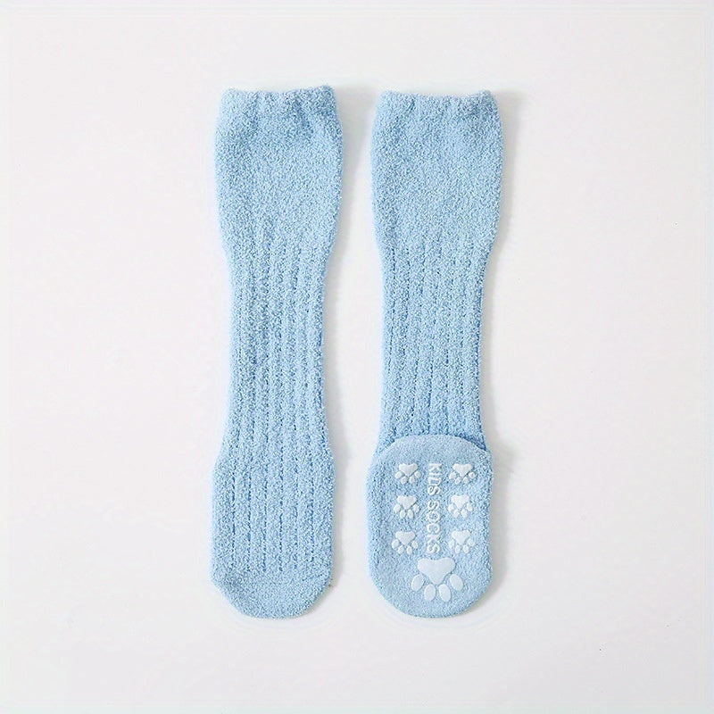 A Pair of Thick, Plush Coral Fleece Knee-High Socks for Infants And Toddlers, Designed to Be Non-Slip for Indoor Use And Prevent Shedding