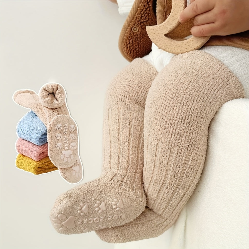 A Pair of Thick, Plush Coral Fleece Knee-High Socks for Infants And Toddlers, Designed to Be Non-Slip for Indoor Use And Prevent Shedding