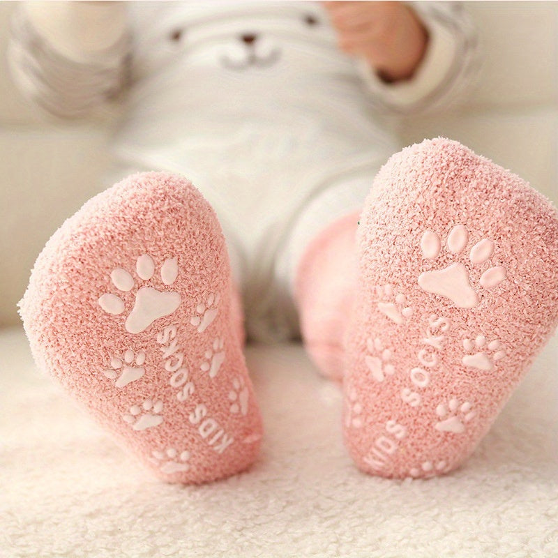 A Pair of Thick, Plush Coral Fleece Knee-High Socks for Infants And Toddlers, Designed to Be Non-Slip for Indoor Use And Prevent Shedding